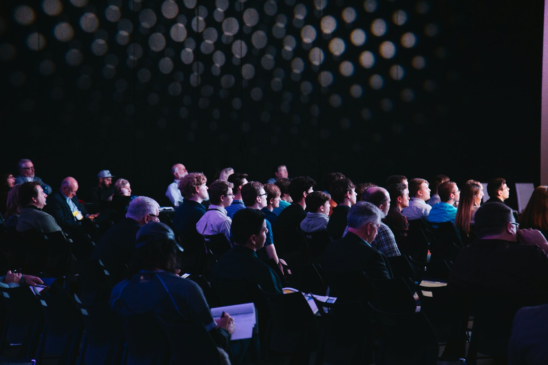 Audience listening to a speaker
